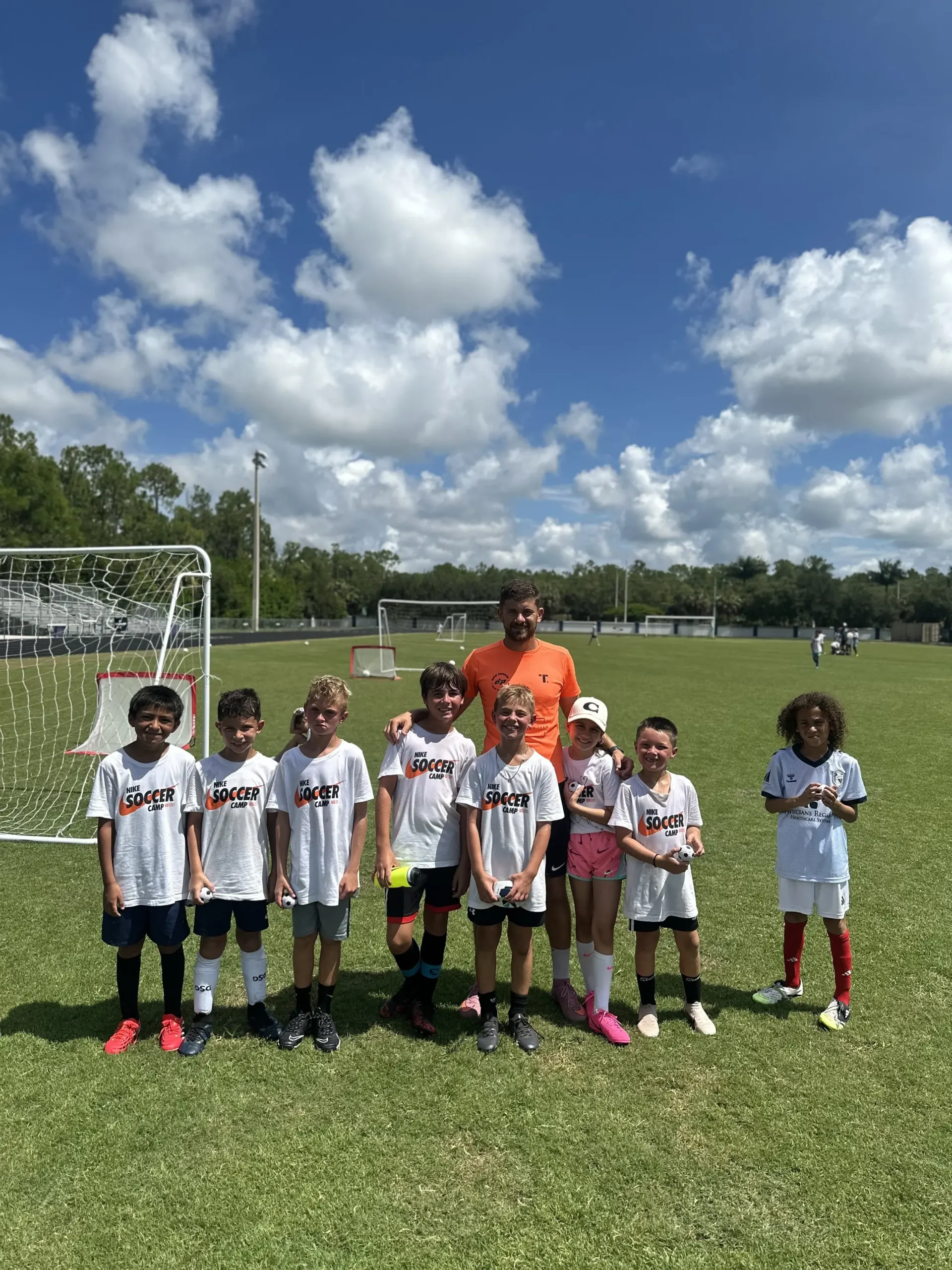 Coach David with a group of campers