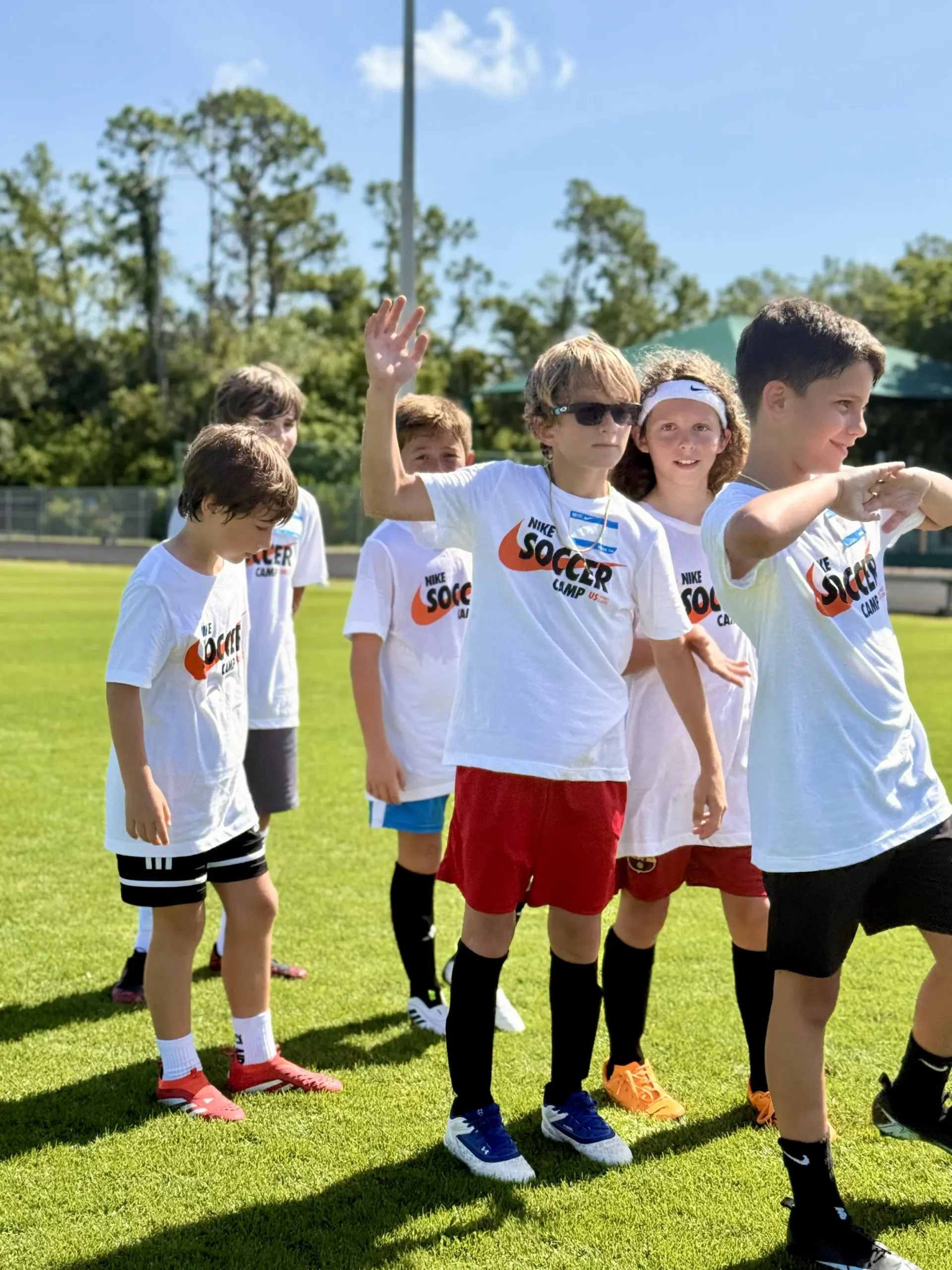 Kids in Nike Soccer Camp shirts