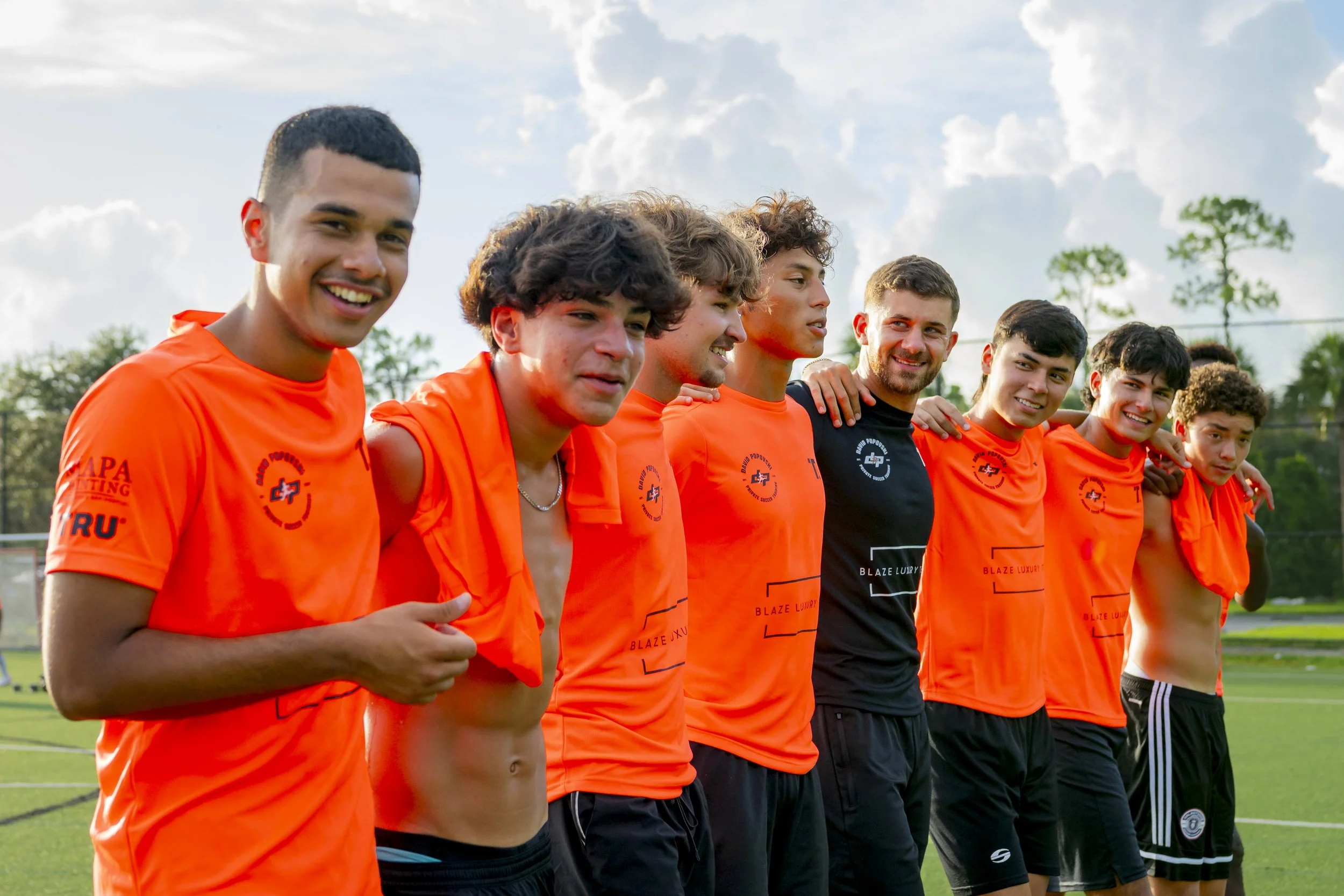 Coach David with a small group of players