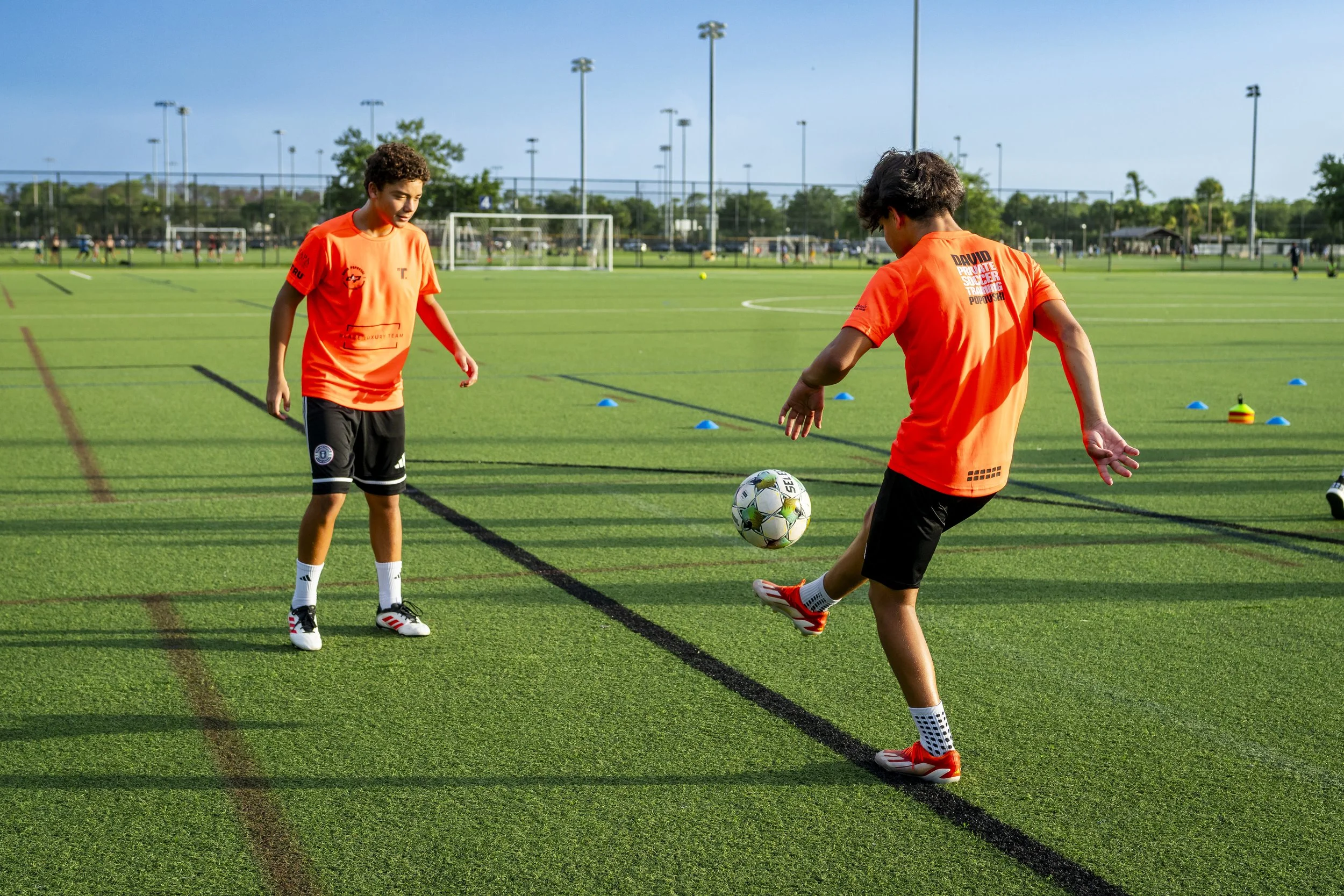 2-on-1 soccer training: two players passing